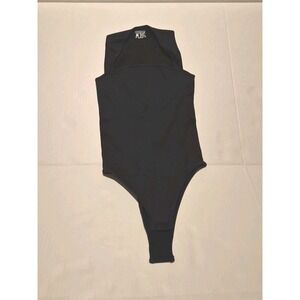 OQQ Women's Black Ribbed Stretch Bodysuit Size S Strap Button Accents